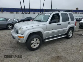 2002 Jeep Liberty Limited with VIN 1J8GK58K52W303098, listed as a Copart auction lot 56005185 with 77,206 mi miles and Clean title. Bid and sale history available at DreamBid. Image 1.