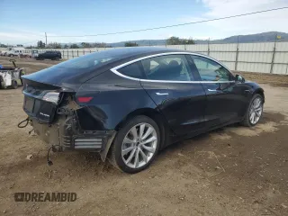 2019 Tesla Model 3 Long Range with VIN 5YJ3E1EB1KF212019, listed as a Copart auction lot 50134385 with 83,478 mi miles and Salvage Title. Bid and sale history available at DreamBid. Image 3.