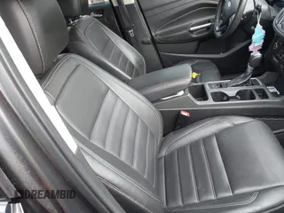 2017 Ford Escape Titanium z VIN 1FMCU0JD9HUE03672, wystawiony jako IAAI lot #42411549 z przebiegiem 89 846 mil mil oraz . Historia ofert i sprzedaży dostępna na DreamBid. Obrazek 5.