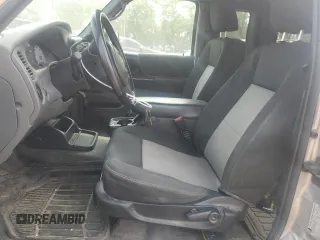 2010 Ford Ranger XLT z VIN 1FTLR4FE7APA30795, wystawiony jako Copart lot #59585595 z przebiegiem 161 414 mil mil oraz Szkoda całkowita • Salvage title. Historia ofert i sprzedaży dostępna na DreamBid. Obrazek 7.