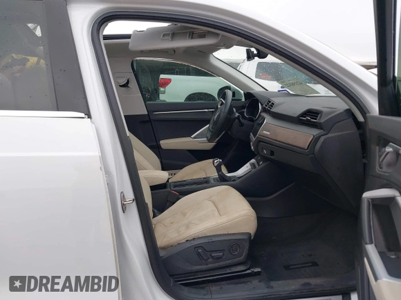 2020 Audi Q3 S line Premium Plus with VIN WA1EECF37L1078293, listed as a IAAI auction lot 42158322 with 56,345 mi miles and . Bid and sale history available at DreamBid. Image 5.