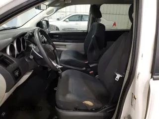 2009 Dodge Grand Caravan SE z VIN 2D8HN44E99R542025, wystawiony jako Copart lot #61003595 z przebiegiem 222 476 mil mil oraz Szkoda całkowita • Salvage title. Historia ofert i sprzedaży dostępna na DreamBid. Obrazek 7.