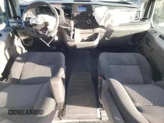 2021 Ford Transit Cargo with VIN 1FTBR1Y87MKA44540, listed as a Copart auction lot 74791034 with 128,242 mi miles and Salvage Title. Bid and sale history available at DreamBid. Image 8.