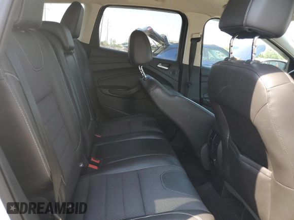 2014 Ford Escape SE z VIN 1FMCU9G92EUC58400, wystawiony jako Copart lot #60491005 z przebiegiem 72 462 mil mil oraz Szkoda całkowita • Salvage title. Historia ofert i sprzedaży dostępna na DreamBid. Obrazek 11.