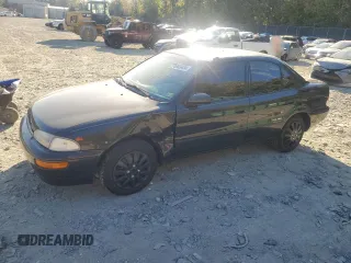 1995 Geo Prizm z VIN 1Y1SK5261SZ077665, wystawiony jako Copart lot #76863434 z przebiegiem 176 535 mil mil oraz Szkody całkowita. Historia ofert i sprzedaży dostępna na DreamBid. Obrazek 1.