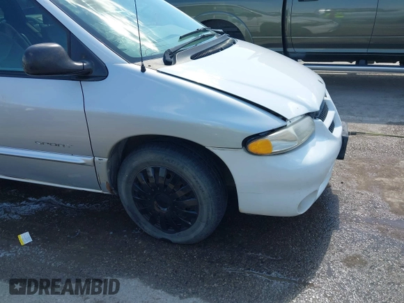 1999 Dodge Caravan z VIN 1B4GP45G2XB554868, wystawiony jako IAAI lot #41882038 z przebiegiem 130 743 mil mil oraz . Historia ofert i sprzedaży dostępna na DreamBid. Obrazek 18.