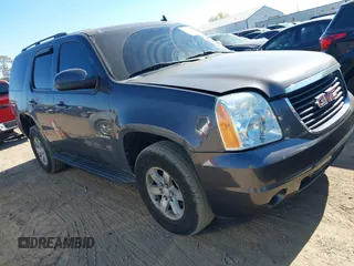 2011 GMC Yukon SLE with VIN 1GKS2AE04BR207818, listed as a IAAI auction lot 40669731 with 312,959 mi miles. Bid and sale history available at carsss.com. Image 1.