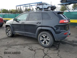 2015 Jeep Cherokee Trailhawk with VIN 1C4PJMBS9FW521872, listed as a Copart auction lot 55338955 with 146,602 mi miles and Salvage title. Bid and sale history available at DreamBid. Image 2.