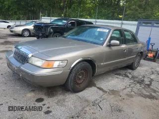 2001 Mercury Grand Marquis GS z VIN 2MEFM74W81X603365, wystawiony jako Copart lot #55440415 z przebiegiem 74 859 mil mil oraz Szkody całkowita. Historia ofert i sprzedaży dostępna na DreamBid. Obrazek 1.