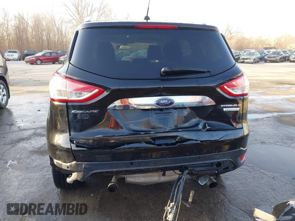 2014 Ford Escape Titanium with VIN 1FMCU0JX0EUC21512, listed as a IAAI auction lot 41781026 with 142,771 mi miles. Bid and sale history available at carsss.com. Image 17.