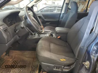 2004 Jeep Grand Cherokee Laredo with VIN 1J4GW48S24C294185, listed as a Copart auction lot 53357945 with 209,169 mi miles and Clean Title. Bid and sale history available at carsss.com. Image 7.