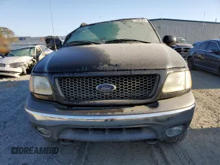 2003 Ford F-150 XLT with VIN 1FTRW08623KD45425, listed as a Copart auction lot 77605404 with 174,369 mi miles and Salvage Title. Bid and sale history available at carsss.com. Image 5.