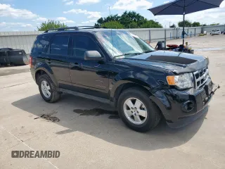 2012 Ford Escape XLS with VIN 1FMCU0C7XCKC81240, listed as a Copart auction lot 60207255 with 82,443 mi miles and Salvage title. Bid and sale history available at DreamBid. Image 4.