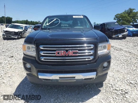 2015 GMC Canyon 4WD SLE with VIN 1GTG6BE32F1115990, listed as a Copart auction lot 71295314 with 118,913 mi miles and Salvage Title. Bid and sale history available at carsss.com. Image 10.