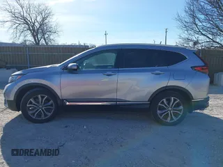 2020 Honda CR-V Touring with VIN 2HKRW2H92LH608050, listed as a IAAI auction lot 41431224 with 52,678 mi miles and . Bid and sale history available at DreamBid. Image 14.