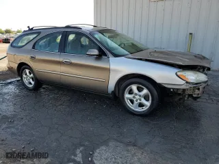 2002 Ford Taurus SE with VIN 1FAFP58S02G278065, listed as a Copart auction lot 53030885 with 131,984 mi miles and Salvage Title. Bid and sale history available at carsss.com. Image 4.