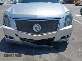 2008 Cadillac CTS RWD z VIN 1G6DV57V880153063, wystawiony jako IAAI lot #42440277 z przebiegiem 158 312 mil mil oraz . Historia ofert i sprzedaży dostępna na DreamBid. Obrazek 6.