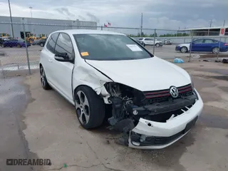 2013 Volkswagen GTI with VIN WVWFV7AJ8DW010600, listed as a IAAI auction lot 41877553 with 167,801 mi miles. Bid and sale history available at carsss.com. Image 1.