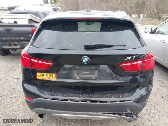 2018 BMW X1 xDrive28i with VIN WBXHT3C34J5K21576, listed as a IAAI auction lot 41822390 with 69,645 mi miles. Bid and sale history available at carsss.com. Image 16.