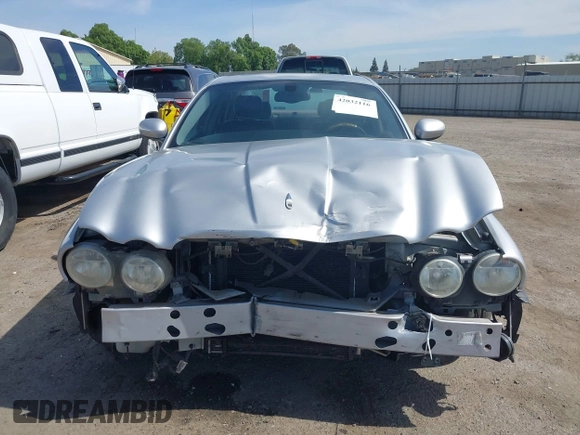 2004 Jaguar XJ 8 with VIN SAJEA71C74SG11470, listed as a IAAI auction lot 42032116 with 209,821 mi miles and . Bid and sale history available at DreamBid. Image 13.