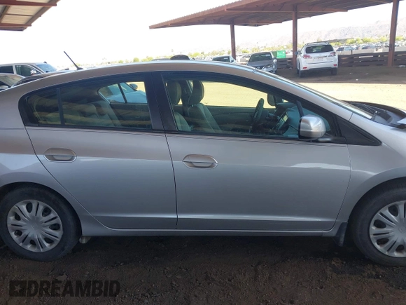 2010 Honda Insight LX z VIN JHMZE2H53AS007016, wystawiony jako IAAI lot #42096274 z przebiegiem 173 519 mil mil oraz . Historia ofert i sprzedaży dostępna na DreamBid. Obrazek 13.