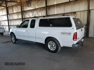 1998 Ford F-150 с VIN 1FTRX18L0WKA53124, выставлен на аукционе Copart как лот 66466945 с пробегом 252 908 миль миль и Чистый • Clean title. История ставок и продаж доступна на DreamBid. Изображение 2.