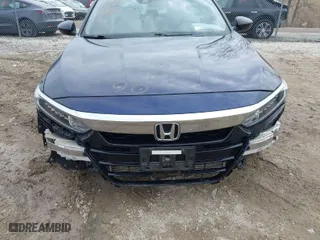 2018 Honda Accord Sedan LX 1.5T with VIN 1HGCV1F18JA042031, listed as a IAAI auction lot 41828316 with 130,864 mi miles. Bid and sale history available at carsss.com. Image 6.