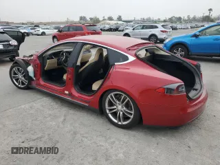 2013 Tesla Model S with VIN 5YJSA1AC2DFP10593, listed as a Copart auction lot 55055115 with Not Provided miles and Clean Title. Bid and sale history available at DreamBid. Image 2.