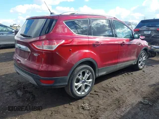 2015 Ford Escape Titanium with VIN 1FMCU9J91FUA97855, listed as a IAAI auction lot 41689650 with 125,487 mi miles. Bid and sale history available at carsss.com. Image 4.