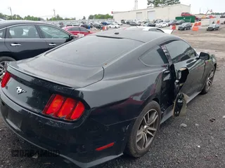 2016 Ford Mustang EcoBoost with VIN 1FA6P8TH2G5293215, listed as a IAAI auction lot 42032241 with 96,960 mi miles and . Bid and sale history available at DreamBid. Image 4.