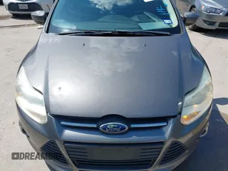 2012 Ford Focus SE with VIN 1FAHP3F28CL211898, listed as a IAAI auction lot 42466544 with 142,933 mi miles and . Bid and sale history available at DreamBid. Image 6.