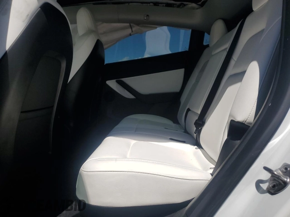 2022 Tesla Model Y Performance with VIN 7SAYGDEF9NF372337, listed as a Copart auction lot 55889345 with 51,099 mi miles and Salvage title. Bid and sale history available at DreamBid. Image 10.