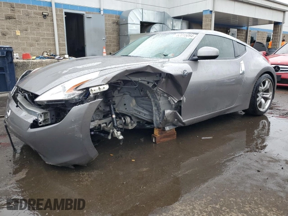 2009 Nissan 370Z Touring with VIN JN1AZ44E69M404789, listed as a Copart auction lot 62015094 with 56,447 mi miles and Salvage Title. Bid and sale history available at carsss.com. Image 1.