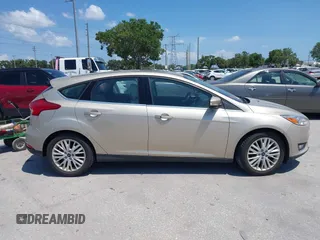 2017 Ford Focus Titanium с VIN 1FADP3N21HL327581, выставлен на аукционе IAAI как лот 42342179 с пробегом 61 489 миль миль и . История ставок и продаж доступна на DreamBid. Изображение 13.