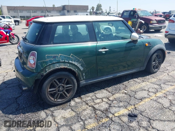 2013 MINI Hardtop with VIN WMWSU3C58DT545046, listed as a IAAI auction lot 42665896 with 60,973 mi miles and . Bid and sale history available at DreamBid. Image 4.