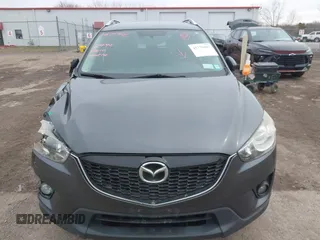 2014 Mazda CX-5 Grand Touring with VIN JM3KE4DY4E0343863, listed as a IAAI auction lot 41770402 with 117,615 mi miles. Bid and sale history available at carsss.com. Image 12.