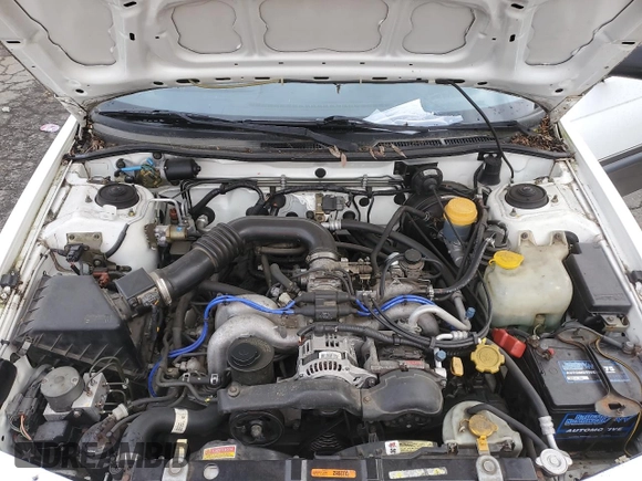 1996 Subaru Legacy Outback with VIN 4S3BG6850T7971454, listed as a Copart auction lot 52082395 with 173,542 mi miles and Salvage title. Bid and sale history available at DreamBid. Image 11.