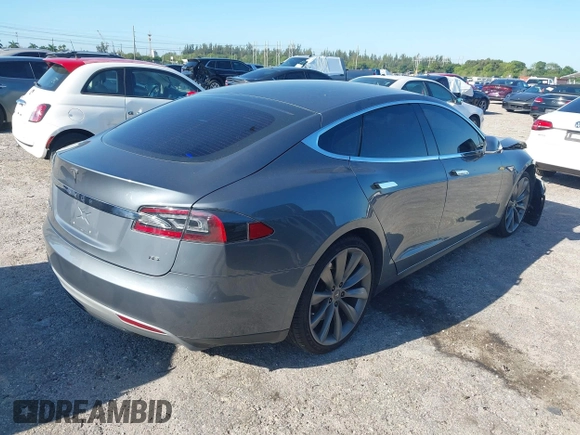 2014 Tesla Model S 60 with VIN 5YJSA1H1XEFP31911, listed as a IAAI auction lot 42029215 with Not Provided miles and . Bid and sale history available at DreamBid. Image 4.
