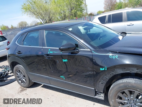 2021 Mazda CX-30 S with VIN 3MVDMBAL6MM302498, listed as a IAAI auction lot 42012356 with 50,477 mi miles and . Bid and sale history available at DreamBid. Image 14.