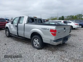 2014 Ford F-150 XL with VIN 1FTEX1EM2EFB00107, listed as a IAAI auction lot 40443721 with 121,674 mi miles and . Bid and sale history available at carsss.com. Image 3.
