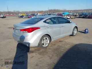 2012 Hyundai Elantra Limited with VIN KMHDH4AE9CU304965, listed as a IAAI auction lot 41752391 with 77,489 mi miles. Bid and sale history available at carsss.com. Image 4.
