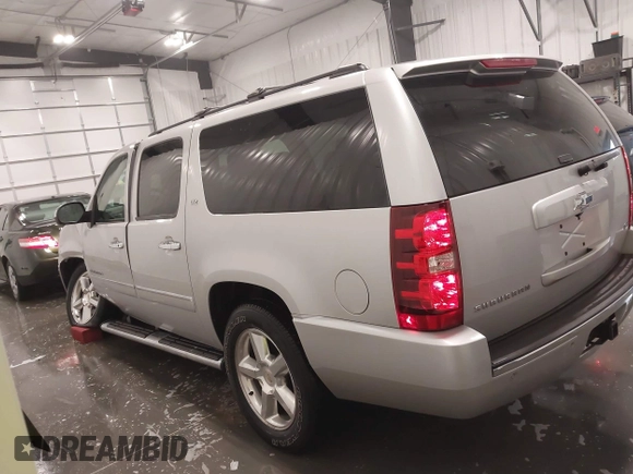 2011 Chevrolet Suburban LTZ with VIN 1GNSKKE31BR143238, listed as a IAAI auction lot 41621927 with 224,313 mi miles and . Bid and sale history available at DreamBid. Image 15.
