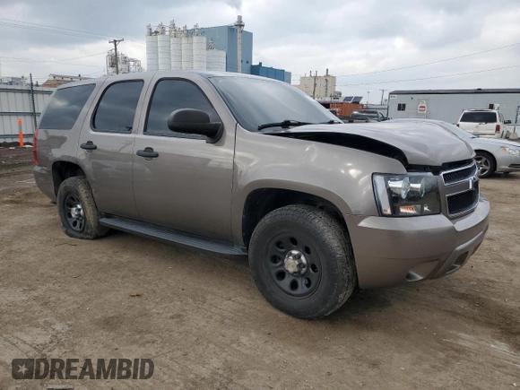 2012 Chevrolet Tahoe Commercial with VIN 1GNSK2E07CR324903, listed as a Copart auction lot 80266624 with 131,700 mi miles and Salvage title. Bid and sale history available at DreamBid. Image 4.
