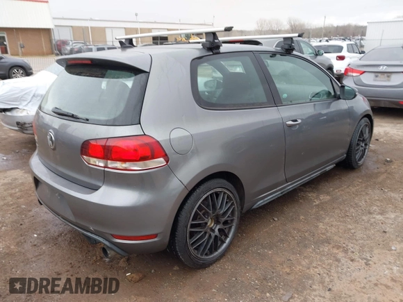 2013 Volkswagen GTI w/Conv & Sunroof z VIN WVWFD7AJ1DW053839, wystawiony jako IAAI lot #41805068 z przebiegiem 90 501 mil mil oraz . Historia ofert i sprzedaży dostępna na DreamBid. Obrazek 4.