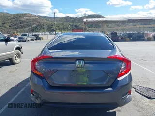 2016 Honda Civic Sedan LX with VIN 19XFC2F51GE034644, listed as a IAAI auction lot 41939884 with 59,433 mi miles. Bid and sale history available at carsss.com. Image 15.