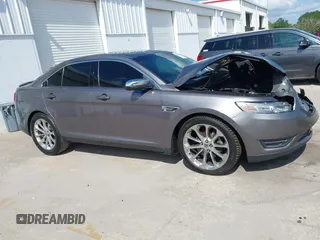 2014 Ford Taurus Limited with VIN 1FAHP2F89EG102814, listed as a IAAI auction lot 41999304 with 254,644 mi miles. Bid and sale history available at carsss.com. Image 13.