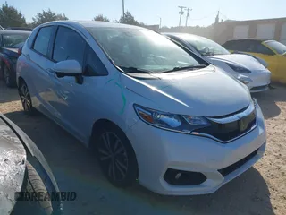 2019 Honda Fit EX z VIN 3HGGK5H8XKM742939, wystawiony jako IAAI lot #41642302 z przebiegiem 59 494 mil mil oraz . Historia ofert i sprzedaży dostępna na DreamBid. Obrazek 1.