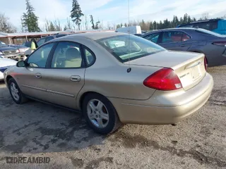 2001 Ford Taurus SEL with VIN 1FAFP56S41G168430, listed as a IAAI auction lot 41675537 with 165,336 mi miles. Bid and sale history available at carsss.com. Image 3.