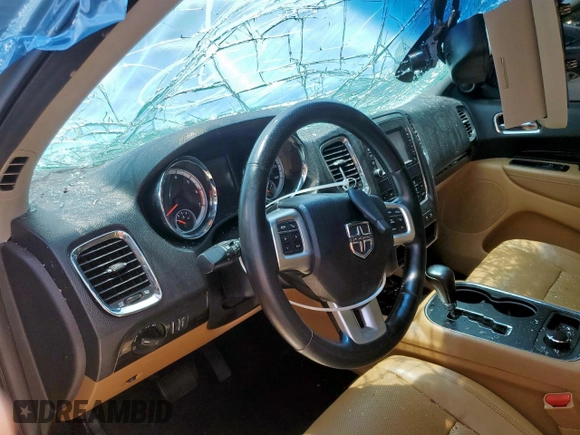 2012 Dodge Durango Citadel with VIN 1C4SDJET6CC240551, listed as a Copart auction lot 58664595 with 180,814 mi miles and Salvage title. Bid and sale history available at DreamBid. Image 7.