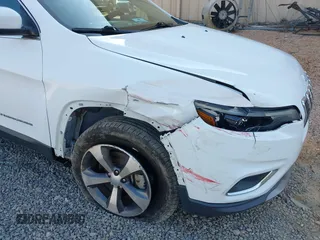 2020 Jeep Cherokee Limited with VIN 1C4PJMDXXLD612052, listed as a IAAI auction lot 42582343 with 96,072 mi miles and . Bid and sale history available at DreamBid. Image 6.